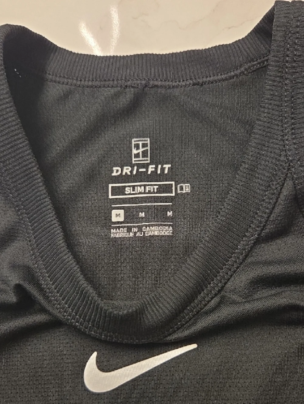 Nike Black Racerback Tank‎ with White Swoosh